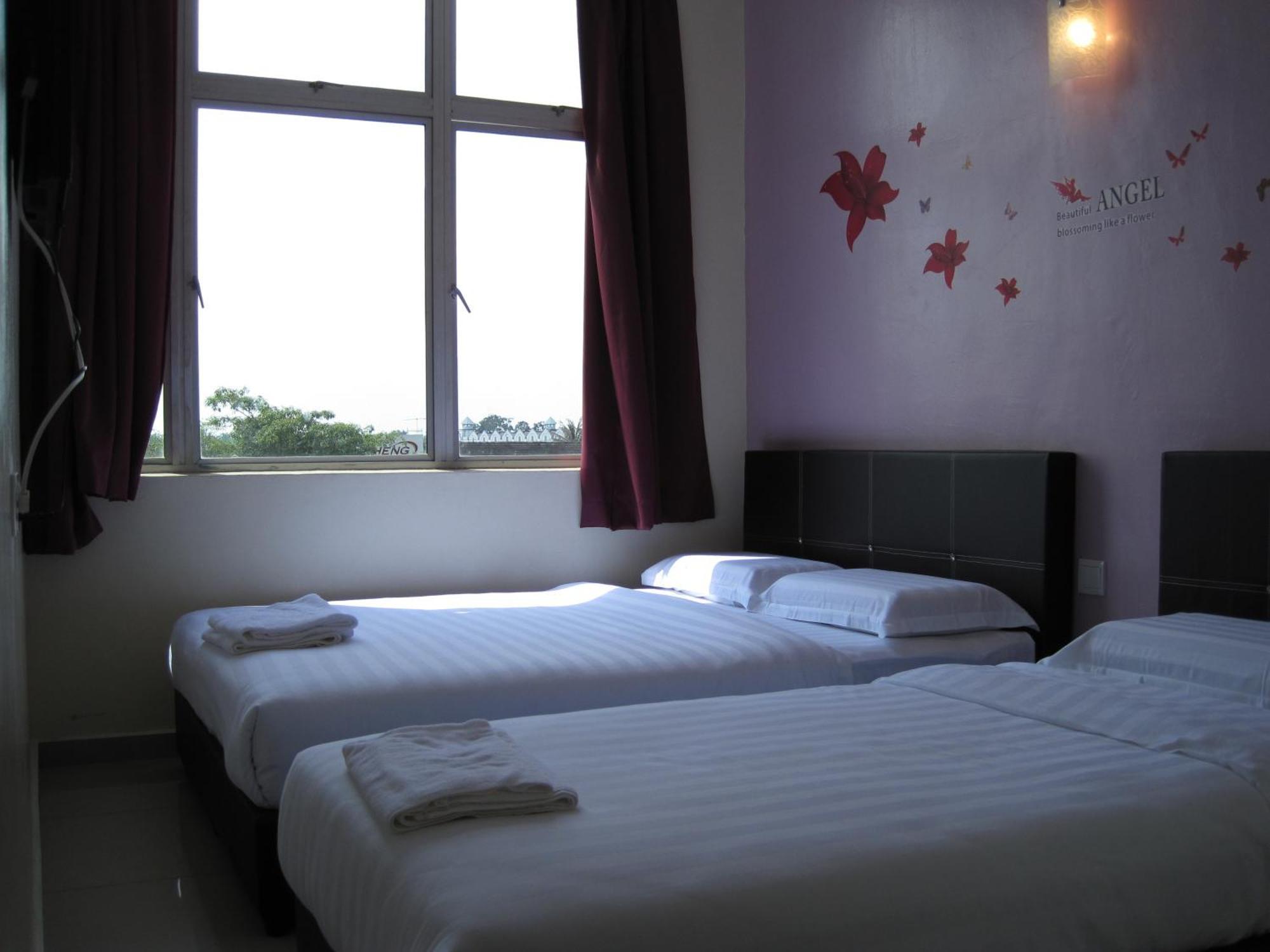 Max Inn Hotel Parit Raja Rum bild